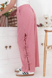Gingham palazzo trousers in scarlet with side tie details and elastic waist.