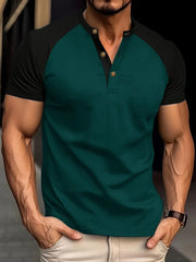 Dark green raglan henley polo shirt with black sleeves and gold button detail