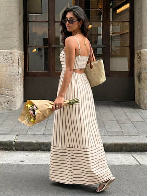 Patterned cutout maxi dress with smocked detail in apricot and brown stripes.