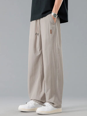 Men's Plus Size Loose Fit Drawstring Casual Pants in Grey, front view