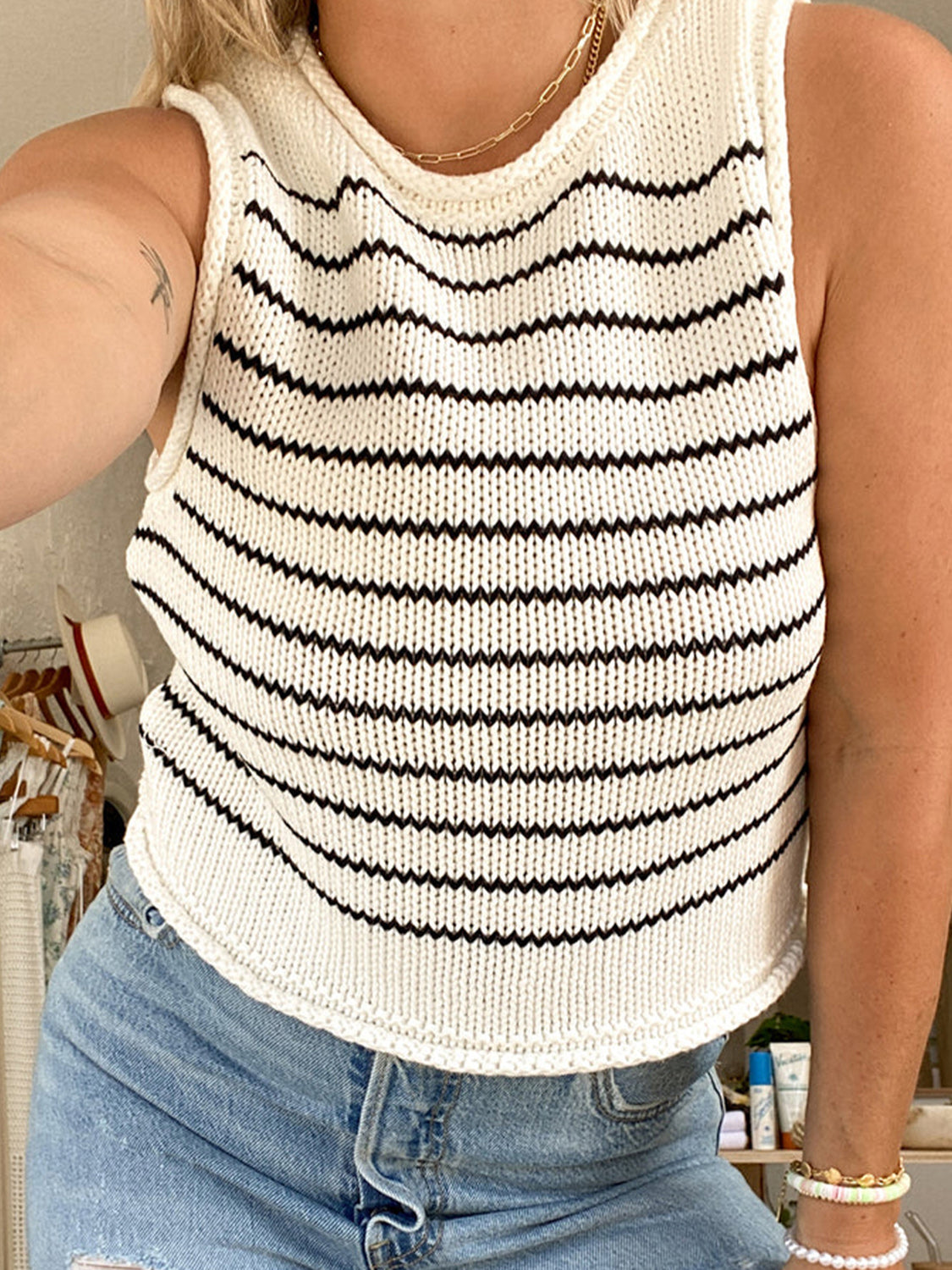 White knit tank top with black zigzag stripes, sleeveless, crew neck, casual style