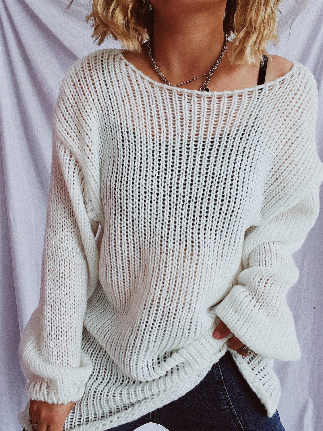 White open-knit slouchy boatneck pullover sweater with a relaxed fit.