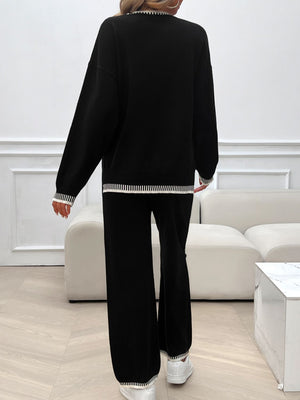 Black ribbed trim knit lounge set with wide leg pants and crewneck sweater.