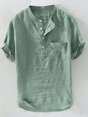 Men's relaxed fit short sleeve band collar shirt in army green with buttoned placket and chest pocket.