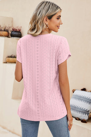 Blush pink eyelet v-neck top with short sleeves and a breathable casual fit.