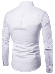 White cotton button-down shirt with long sleeves and buttoned cuffs.