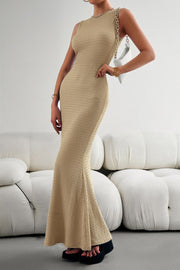 Textured maxi dress in Sand with a round neckline and sleeveless design.