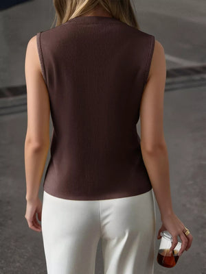 Brown knit vest with ribbed neckline and armholes, sleeveless.