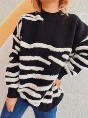 Black and white textured stripe knit crewneck sweater with relaxed fit.