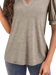 Camel t-shirt with puff sleeves and notched V-neck.
