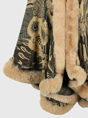Camel feather print cape with faux fur trim and pom poms.