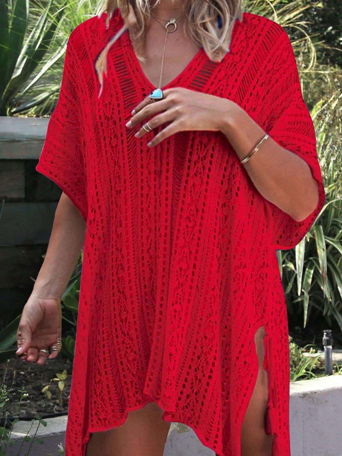 Red open-knit V-neck beach cover-up with side slits and short sleeves.
