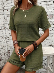 Moss green textured knit set with fringe trim on short sleeves and shorts.
