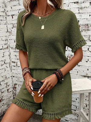 Moss green textured knit set with fringe trim on short sleeves and shorts.