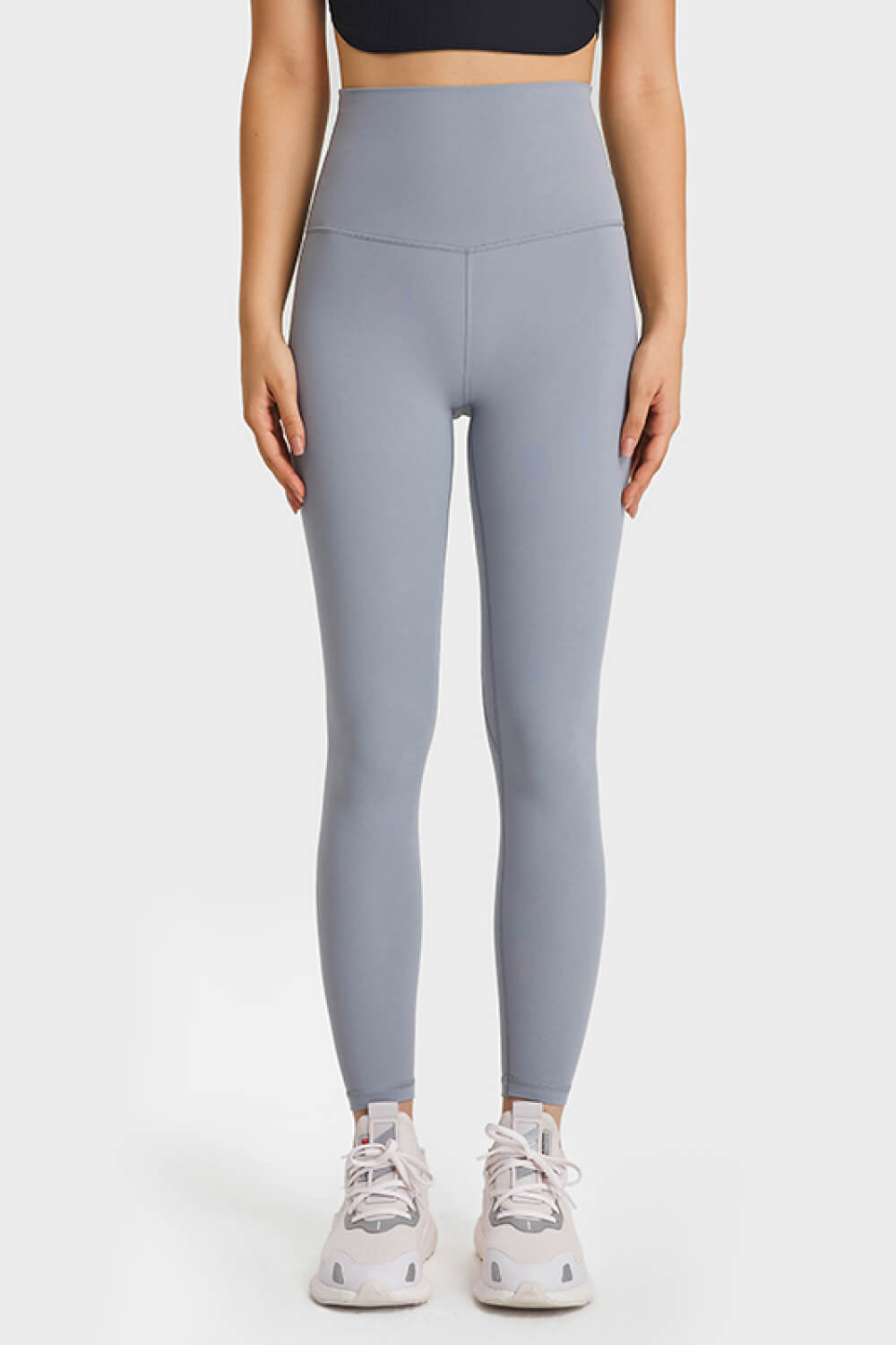 SoftLux High Rise Leggings in Steel, full length, v-waist detail, styled with sneakers.