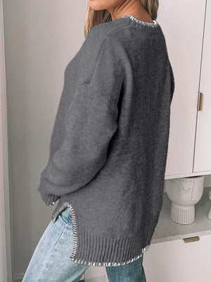Dark Gray crew neck sweater with contrast stitching detail on neckline and hem.