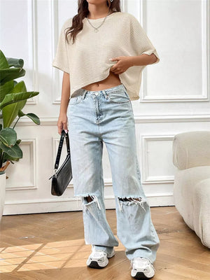 Apricot waffle-knit cropped t-shirt with crew neck and boxy fit.