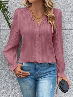 Light Mauve textured pleat blouse with lace trim neckline and cuffs.
