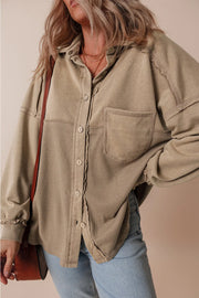 Tan waffle knit overshirt with patch pocket and button front, styled casually.