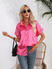 Hot Pink satin boxy sleeve blouse with button-down front and cuffed sleeves.