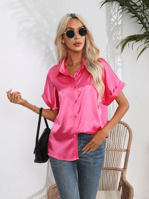 Hot Pink satin boxy sleeve blouse with button-down front and cuffed sleeves.