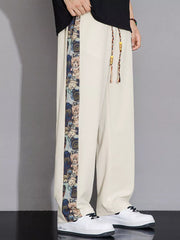 Men's eggshell sweatpants with printed side stripe and drawstring detail