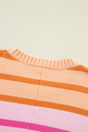 Ombre stripe knit sweater with ribbed neckline in sherbet and pink tones.