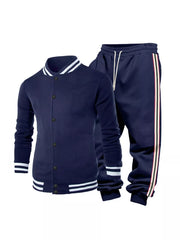 Navy striped two-piece men's track set with contrast trim on collar and cuffs.