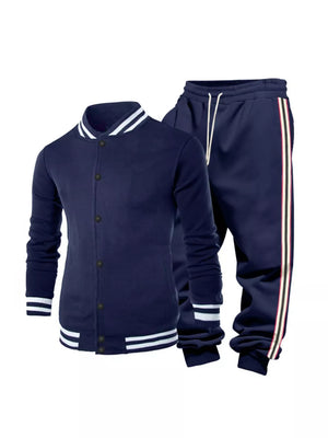 Navy striped two-piece men's track set with contrast trim on collar and cuffs.