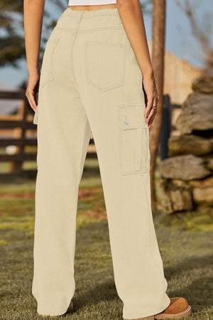 Tan denim cargo pants with utility pockets and a relaxed fit.