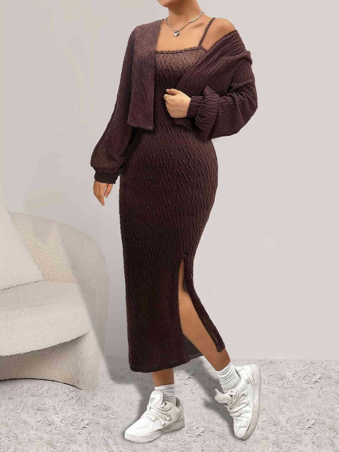 Brown textured midi dress with thigh slit and matching cropped cardigan with balloon sleeves.