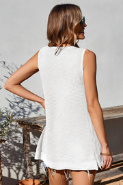 White waffle knit tank top with asymmetric hem and raw edge detail.
