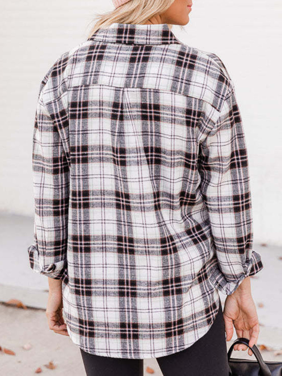 Relaxed fit plaid button-down shirt in white with black and pink plaid.