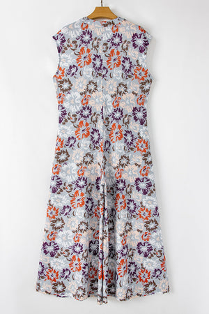 Floral cap-sleeve wide-leg jumpsuit with a button detail and a vintage floral print.