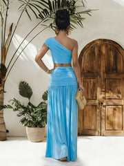 Sky blue one-shoulder ruched crop top and maxi skirt set with gathered waist detail.