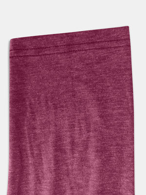 Buttoned henley slouch tee in cerise heather fabric with visible stitching detail.