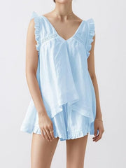 Light blue ruffled V-neck top and shorts set with lace trim and tiered hem.