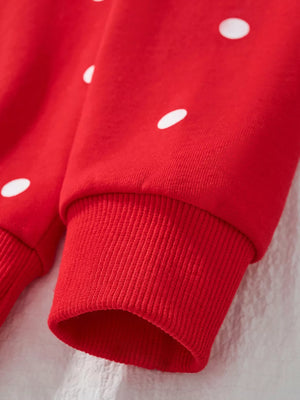 Red cotton sweatshirt with white polka dots and ribbed cuffs