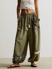 Moss drawstring harem pants with lace trim on pockets and hem