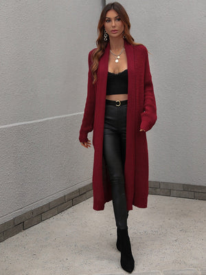 Textured knit maxi cardigan in wine with open front and long sleeves.