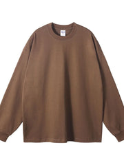 Oversized brown crewneck pullover sweatshirt, 100% cotton, long sleeves, drop shoulders.