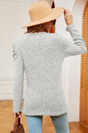 Light gray ribbed knit blouse with textured drape sleeves and a casual fit.