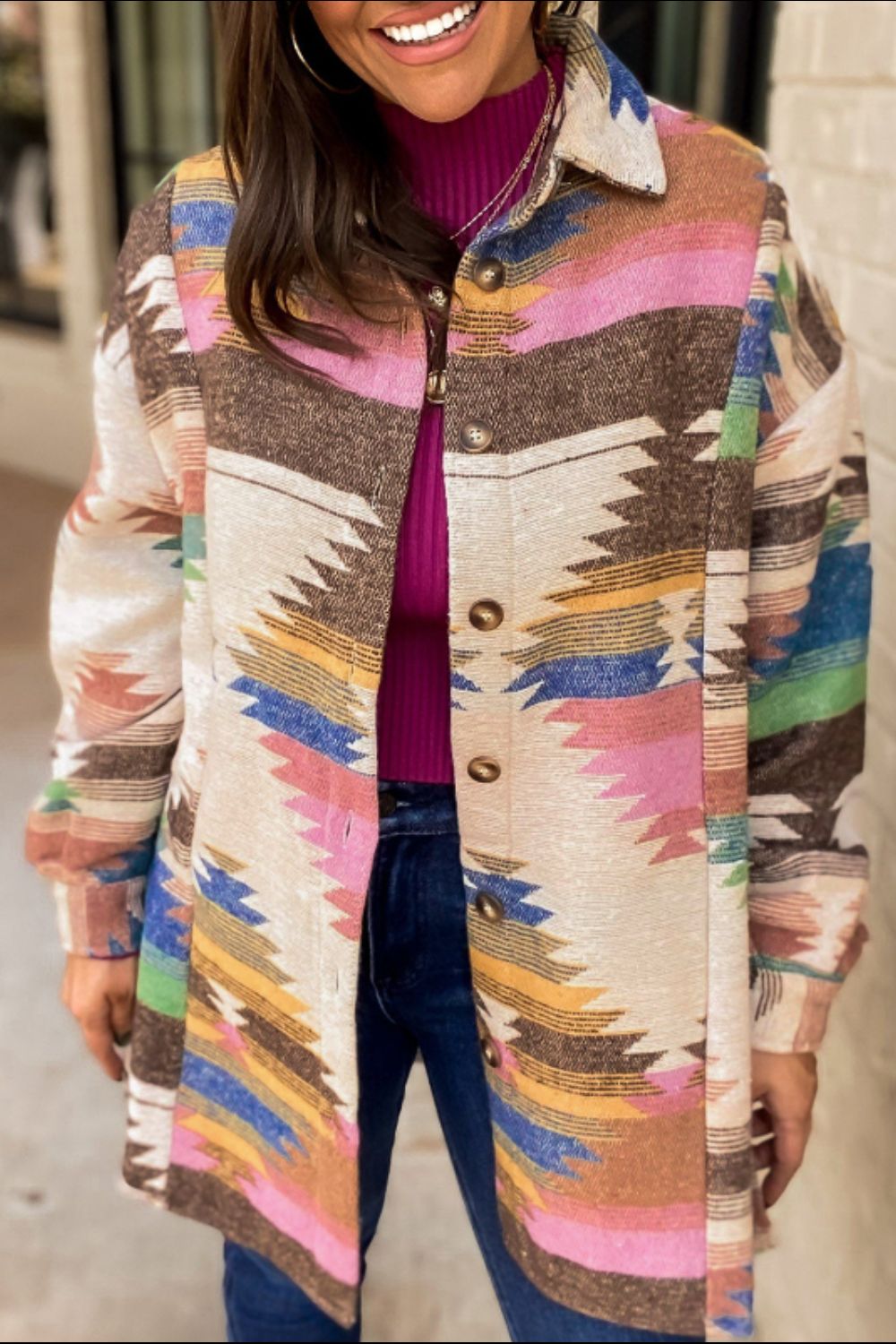 Southwestern print shirt jacket in beige with button front and colorful geometric pattern.