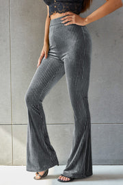 Dark gray ribbed velvet palazzo trousers with a flared leg
