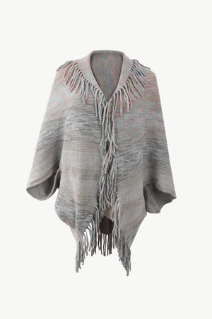 Textured stripe fringe cape in gray with subtle pink and blush accents, acrylic knit.