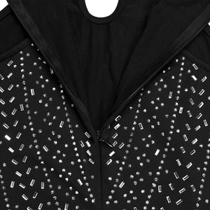 Black halter neck romper with scattered rhinestones and zipper detail.