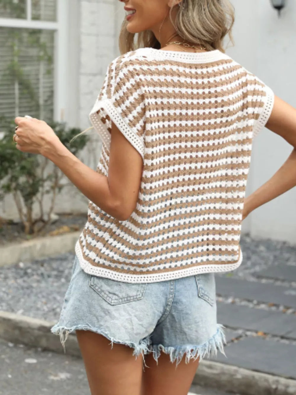 Chic striped crochet knit top in khaki and white with short sleeves and a relaxed fit.