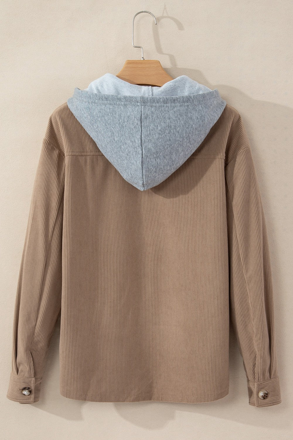 Corduroy shirt jacket in Mocha with contrast light gray hood and button cuffs.