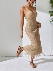 Camel crochet maxi dress with fringe hem and V-neck, styled with sandals.