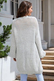 Light Gray textured knit cocoon cardigan with balloon sleeves and an open front.
